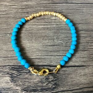 NWOT faux turquoise bright blue and gold tone bracelet